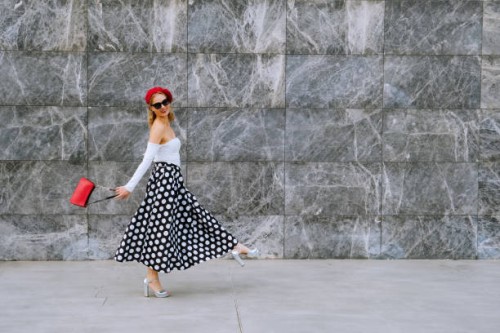 elegant woman walking. - fashion stock pictures, royalty-free photos & images