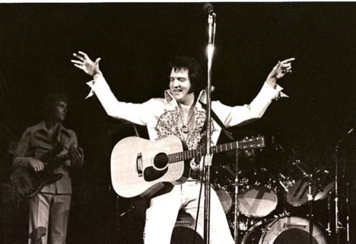 Elvis Presley performs in concert at the Milwaukee Arena on April 27, l977 in Milwaukee, Wisconsin.