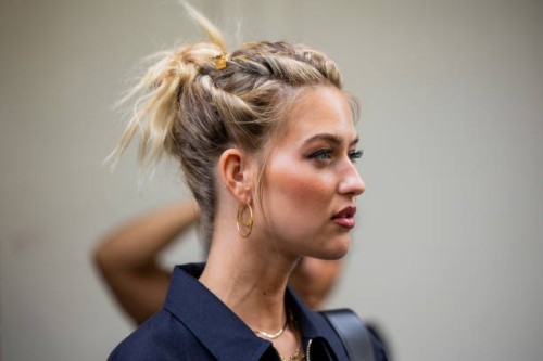 Emili Sindlev wears earrings outside Fendi during the Milan Fashion Week - Womenswear Spring/Summer 2024 on September 20, 2023 in Milan, Italy.