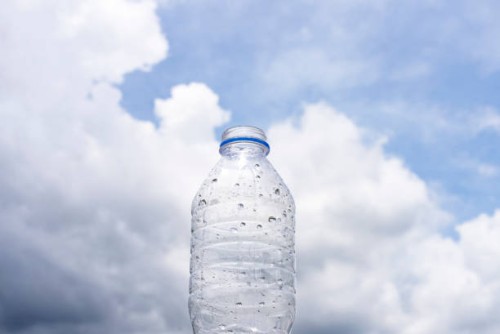 empty plastic bottle cloud - junk food stock pictures, royalty-free photos & images