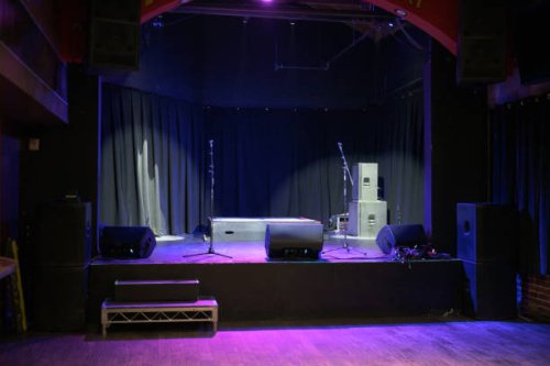 empty stage with spotlight - concert stock pictures, royalty-free photos & images