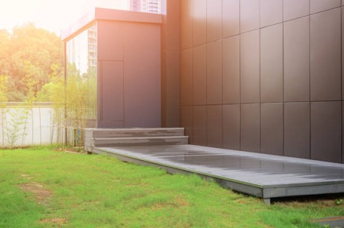 empty wooden platform and grass land outside of the modern office building,guangzhou,guangdong,china. - garden decoration stock pictures, royalty-free photos & images