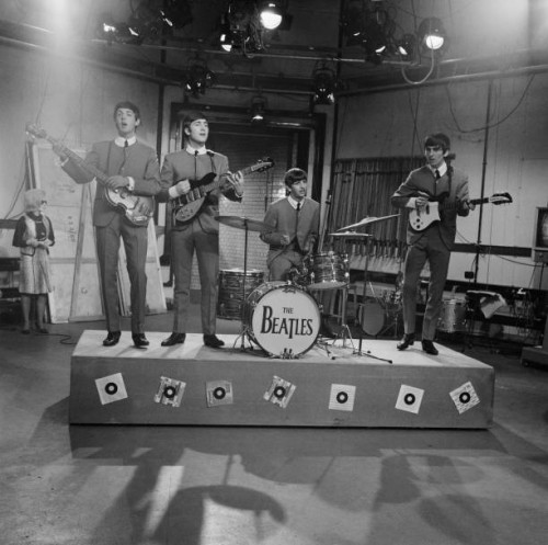 English rock and pop group The Beatles, from left Paul McCartney, John Lennon , Ringo Starr and George Harrison , on stage during rehearsals for the...