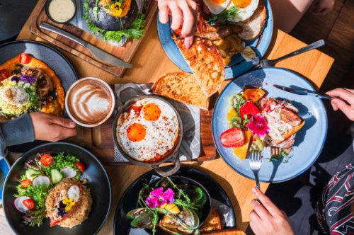 enjoying a brunch together. - food stock pictures, royalty-free photos & images