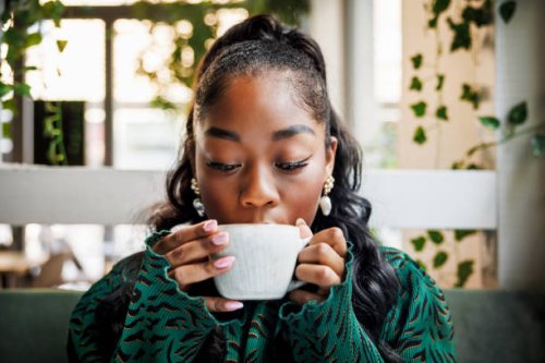 enjoying a warm beverage - coffee stock pictures, royalty-free photos & images