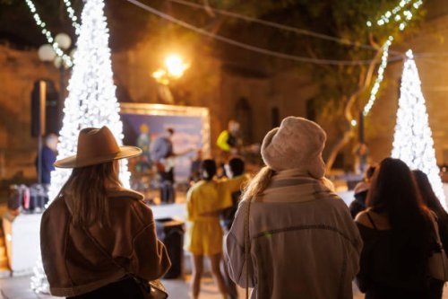 enjoying christmas holidays in the city - concert stock pictures, royalty-free photos & images