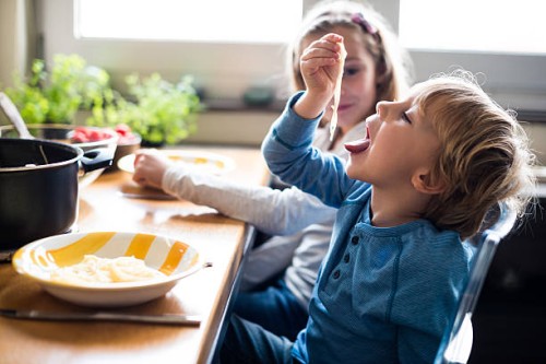 enjoying pasta time - food stockfoto's en -beelden