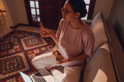 enjoying small treats. pregnancy moments . - junk food stock pictures, royalty-free photos & images