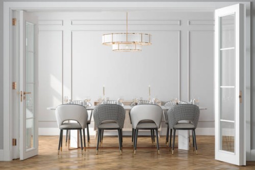 entrance of dining room with dining table, chairs and empty white wall in background - home decoration stock pictures, royalty-free photos & images