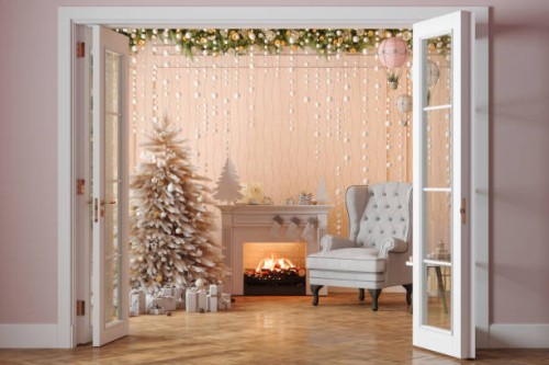 entrance of living room with christmas tree, ornaments, gift boxes, fireplace and armchair - home decoration stock pictures, royalty-free photos & images