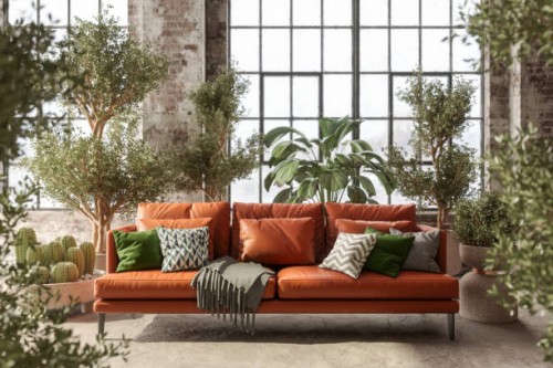 environmentally friendly living room with leather sofa, green plants and brick wall - home decoration stock pictures, royalty-free photos & images