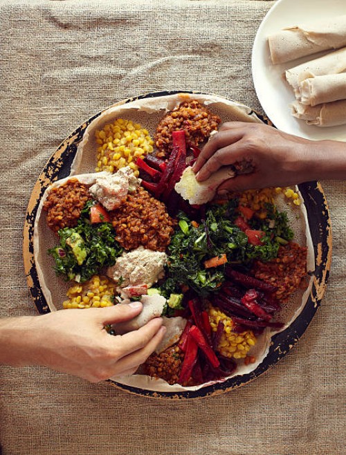 ethiopian injera and wat meal - food stock pictures, royalty-free photos & images