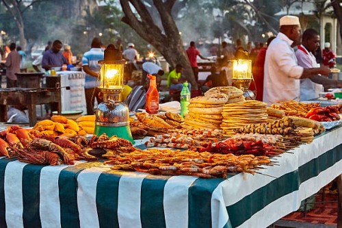 evening food markets at stone town - food stock pictures, royalty-free photos & images