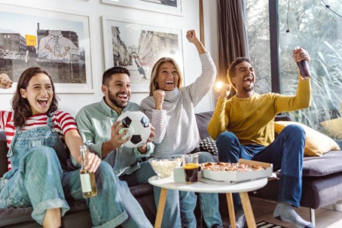 excited sports fans cheering for sport team - junk food stock pictures, royalty-free photos & images