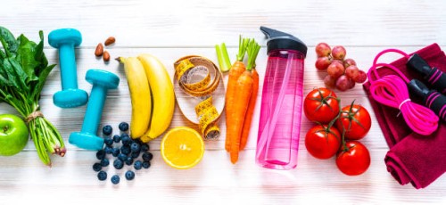 exercising and healthy food: raibow colored fruits, vegetables and fitness items - food stock pictures, royalty-free photos & images