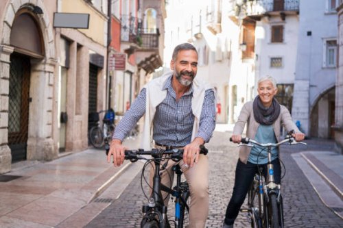 exploring city with bicycle - travel stock pictures, royalty-free photos & images