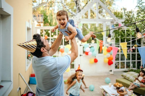 family celebrates a birthday together - garden decoration stock pictures, royalty-free photos & images