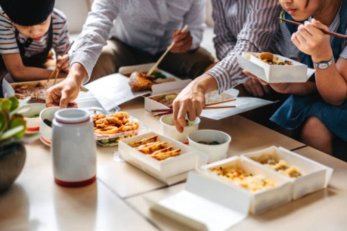 family eating takeout food - junk food stock pictures, royalty-free photos & images