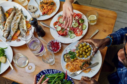 family having home cooked meal together - food stock pictures, royalty-free photos & images