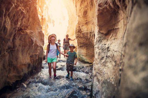 family hiking through rivier in andalusia, spain - travel stock pictures, royalty-free photos & images