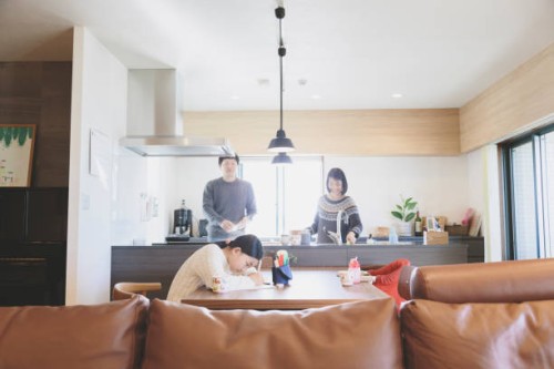 family in the living room at home - home decoration stock pictures, royalty-free photos & images