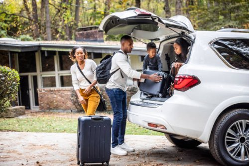 family loading suitcases in car for family vacation - travel stock pictures, royalty-free photos & images