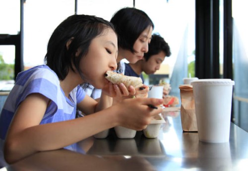 family lunch out - junk food stock pictures, royalty-free photos & images