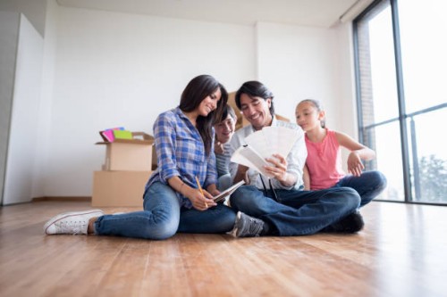 family moving home - home decoration stock pictures, royalty-free photos & images