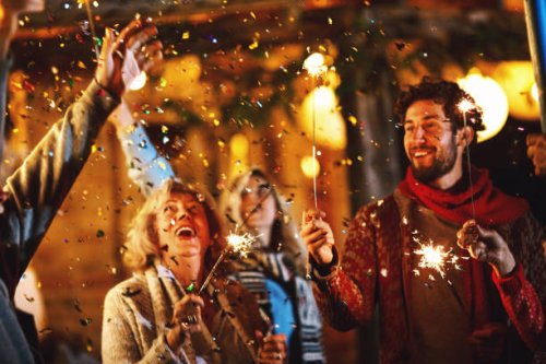 family new year's eve party. - garden decoration stock pictures, royalty-free photos & images