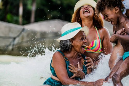 family playing at water park pool - travel stock pictures, royalty-free photos & images
