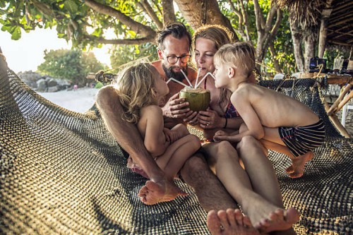 family relaxing in hammock. - travel stock pictures, royalty-free photos & images