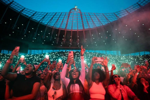 Fans as Wizkid performs at Tottenham Hotspur Stadium on July 29, 2023 in London, England.