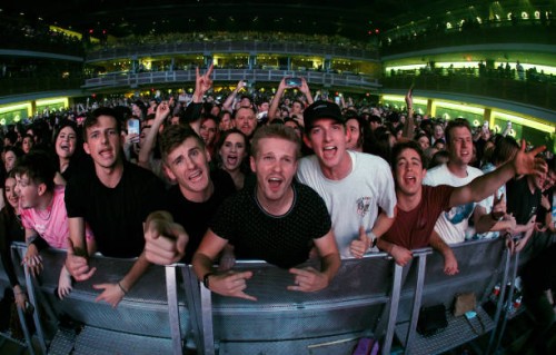 Fans attend a concert by recording artist Machine Gun Kelly during a stop of his Tickets to My Downfall tour at The Theater at Virgin Hotels Las...
