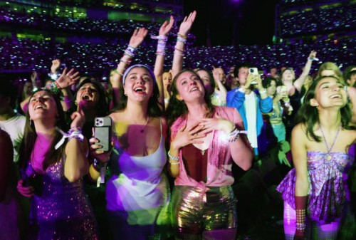 Fans attend as Taylor Swift performs onstage during Taylor Swift | The Eras Tour at Levi's Stadium on July 28, 2023 in Santa Clara, California.