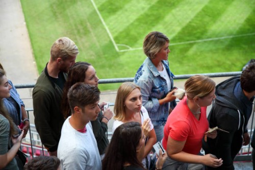 fans getting to their stadium seats - concert stock pictures, royalty-free photos & images