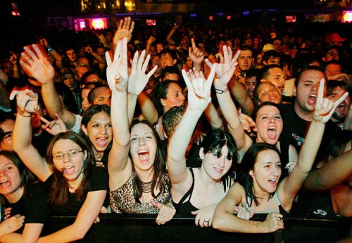 Fans react as Papa Roach performs at The Joint inside the Hard Rock Hotel & Casino August 5, 2005 in Las Vegas, Nevada. The rock group is touring in...