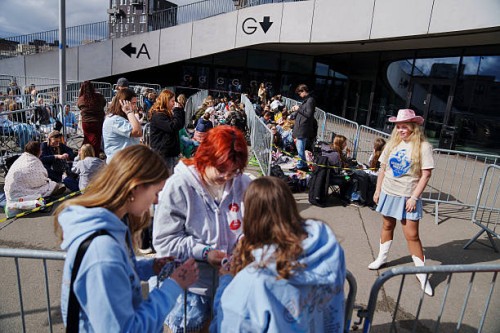 Fans wait in line outside the Royal Arena in Copenhagen before tonight's Sabrina Carpenter concert on March 31, 2025. / Denmark OUT