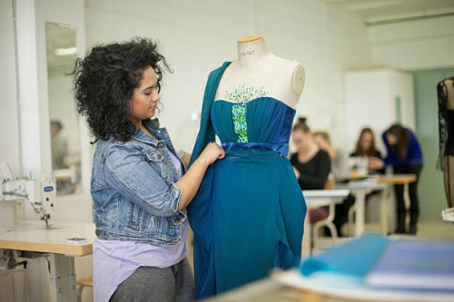 fashion design students in class - fashion stock pictures, royalty-free photos & images