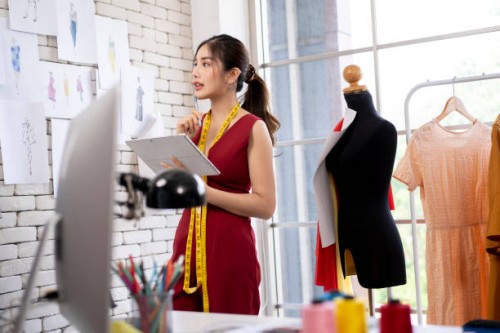 fashion designer sketching. - fashion stock pictures, royalty-free photos & images