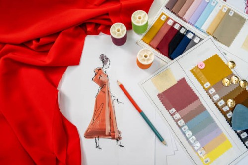 fashion designers working in the studio. - fashion stock pictures, royalty-free photos & images