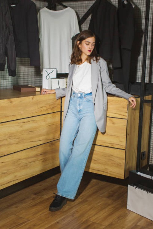 fashion model in stylish clothes in shop. modern style. shopping - fashion stock pictures, royalty-free photos & images