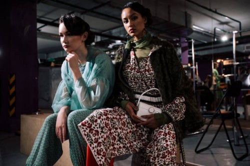 fashion portrait of two women indoors together, lifestyle photography. person of color and white girl, diversity concept photo. - fashion stock pictures, royalty-free photos & images