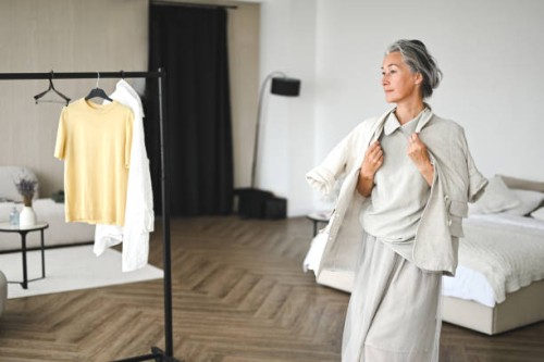 fashion stylist choosing capsule clothes - fashion stock pictures, royalty-free photos & images