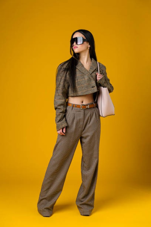 fashionable teenage girl in front of plain background - fashion stock pictures, royalty-free photos & images