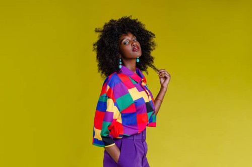 fashionable woman in colorful shirt - fashion stock pictures, royalty-free photos & images