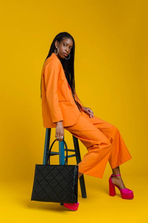 fashionable woman wearing smart casual outfit - fashion stock pictures, royalty-free photos & images
