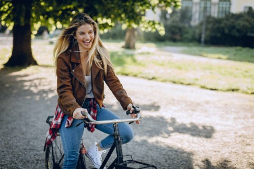 fashionable woman with vintage bike - fashion stock pictures, royalty-free photos & images