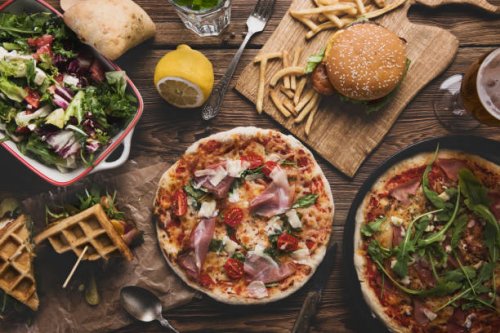 fast food on old wooden background. - junk food stock pictures, royalty-free photos & images
