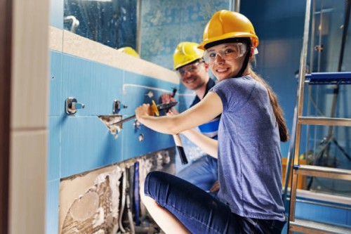 father and daughter doing some home demolition - renovation - home decoration stock pictures, royalty-free photos & images