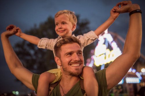 father and son on festival - concert stock pictures, royalty-free photos & images
